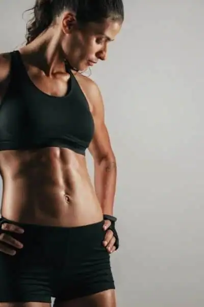 Toning Up at Home: The Ultimate Guide to Bodyweight Exercises 2 Image of woman's toned stomach after bodyweight exercises Feltham and non-surgical treatment from Lipo 360