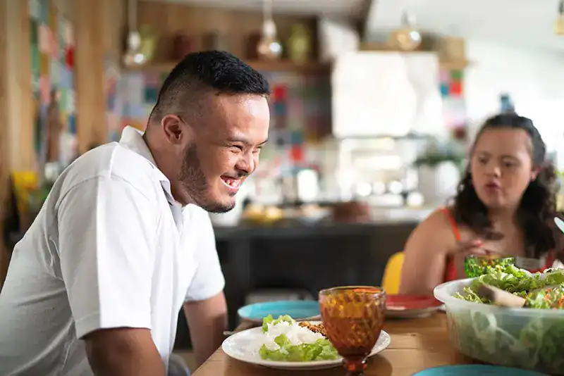 Empowering Weight Loss: A Comprehensive Guide for Individuals with Disabilities 2 Image of a disabled man and balance around nutrition to aid weight loss Feltham