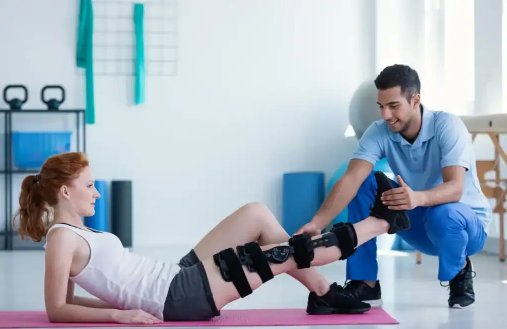 Debunking Meal Timing Myths: The Truth About Muscle Recovery 1 Woman having treatment to help muscle recovery Feltham after an injury